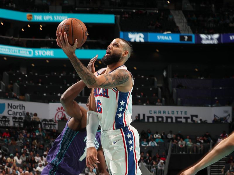 CHARLOTTE, NC - DECEMBER 3: Caleb Martin #16 of the Philadelphia 76ers drives to the basket during the game against the Charlotte Hornets during an NBA Emirates Cup game on December 3, 2024 at Spectrum Center in Charlotte, North Carolina. NOTE TO USER: User expressly acknowledges and agrees that, by downloading and or using this photograph, User is consenting to the terms and conditions of the Getty Images License Agreement. Mandatory Copyright Notice: Copyright 2024 NBAE (Photo by Kent Smith/NBAE via Getty Images)