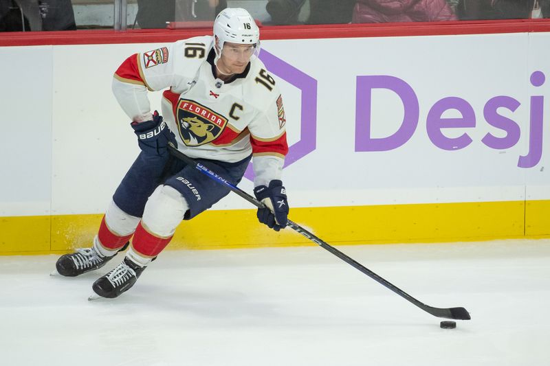 Nov 27 2023; Ottawa, Ontario, CAN; Florida Panthers center Aleksander Barkov (16) skates with the puck in the third period against the Ottawa Senators at the Canadian Tire Centre. Mandatory Credit: Marc DesRosiers-USA TODAY Sports