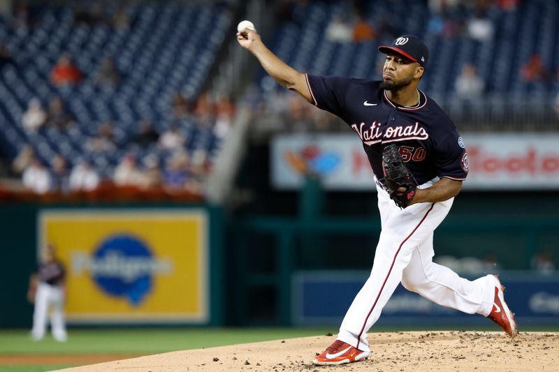 Sep 18, 2023; Washington, District of Columbia, USA; Washington Nationals starting pitcher Joan Adon (60) pitches against the Chicago White Sox during the second inning at Nationals Park. Mandatory Credit: Geoff Burke-USA TODAY Sports