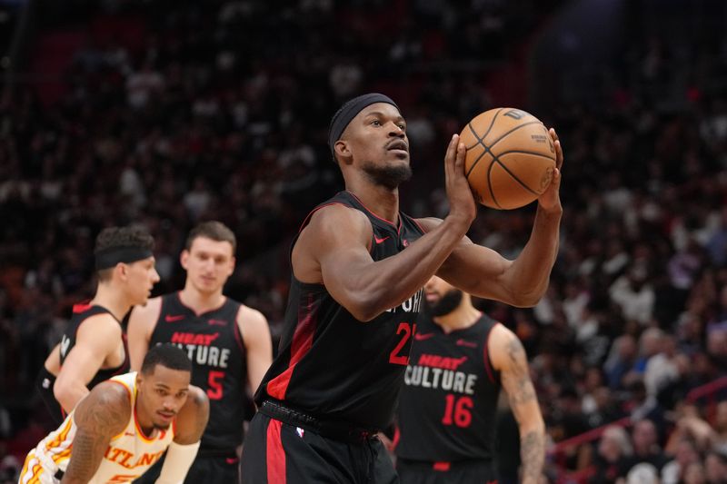 MIAMI, FL - JANUARY 19: Jimmy Butler #22 of the Miami Heat shoots a free throw during the game against the Atlanta Hawks  on January 19, 2024 at Kaseya Center in Miami, Florida. NOTE TO USER: User expressly acknowledges and agrees that, by downloading and or using this Photograph, user is consenting to the terms and conditions of the Getty Images License Agreement. Mandatory Copyright Notice: Copyright 2024 NBAE (Photo by Eric Espada/NBAE via Getty Images)