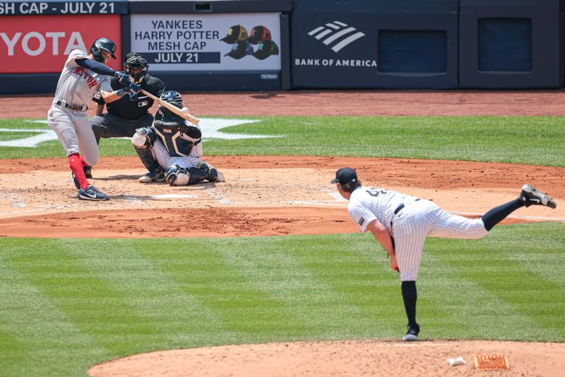 Jul 6, 2024; Bronx, New York, USA; Boston Red Sox shortstop David Hamilton (70) double during the third inning against New York Yankees starting pitcher Gerrit Cole (45) at Yankee Stadium. Mandatory Credit: Vincent Carchietta-USA TODAY Sports