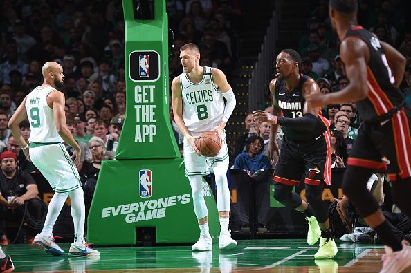 BOSTON, MA - OCTOBER 27: Kristaps Porzingis #8 of the Boston Celtics handles the ball during the game against the Miami Heat on October 27, 2023 at the TD Garden in Boston, Massachusetts. NOTE TO USER: User expressly acknowledges and agrees that, by downloading and or using this photograph, User is consenting to the terms and conditions of the Getty Images License Agreement. Mandatory Copyright Notice: Copyright 2023 NBAE  (Photo by Brian Babineau/NBAE via Getty Images)