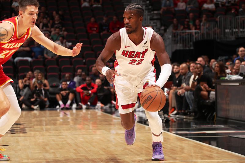 MIAMI, FL - OCTOBER 16: Jimmy Butler #22 of the Miami Heat dribbles the ball during the game against the Atlanta Hawks on October 16, 2024 at Miami-Dade Arena in Miami, Florida. NOTE TO USER: User expressly acknowledges and agrees that, by downloading and or using this Photograph, user is consenting to the terms and conditions of the Getty Images License Agreement. Mandatory Copyright Notice: Copyright 2024 NBAE (Photo by Issac Baldizon/NBAE via Getty Images)