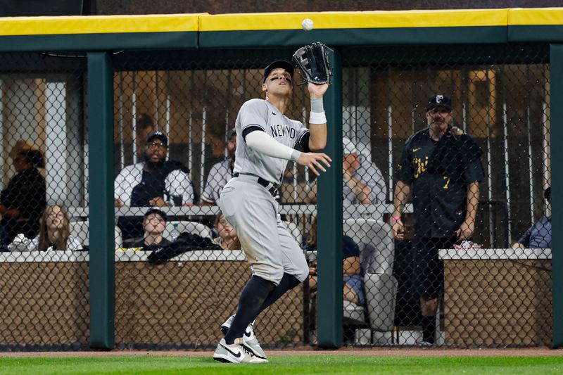 Aug 9, 2023; Chicago, Illinois, USA; New York Yankees right fielder Aaron Judge (99) catches the fly ball of Chicago White Sox first baseman Andrew Vaughn during the third inning at Guaranteed Rate Field. Mandatory Credit: Kamil Krzaczynski-USA TODAY Sports