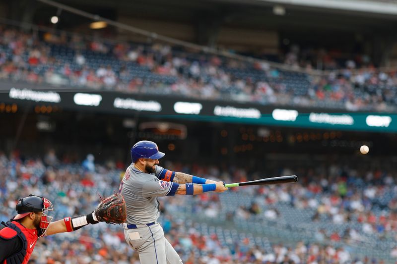 Jun 4, 2024; Washington, District of Columbia, USA; New York Mets catcher Tomas Nido (3) singles against the Washington Nationals during the third inning at Nationals Park. Mandatory Credit: Geoff Burke-USA TODAY Sports