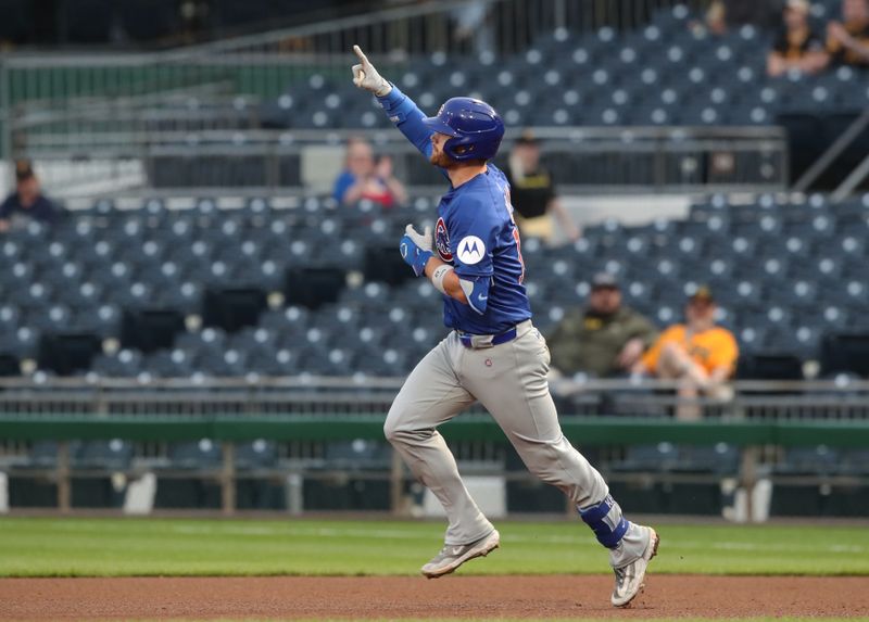 Apr 29, 2025; Pittsburgh, Pennsylvania, USA;  Chicago Cubs catcher Carson Kelly (15) circles the bases after a two-run home run against the Pittsburgh Pirates during the fourth inning at PNC Park. Mandatory Credit: Charles LeClaire-Imagn Images