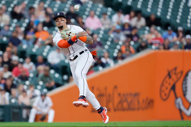 Aug 29, 2023; Detroit, Michigan, USA; Detroit Tigers shortstop Javier Baez (28) makes a throw in the fifth inning against the New York Yankees at Comerica Park. Mandatory Credit: Rick Osentoski-USA TODAY Sports