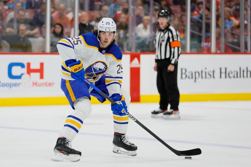 Apr 4, 2023; Sunrise, Florida, USA; Buffalo Sabres defenseman Owen Power (25) moves the puck during the first period against the Florida Panthers at FLA Live Arena. Mandatory Credit: Sam Navarro-USA TODAY Sports