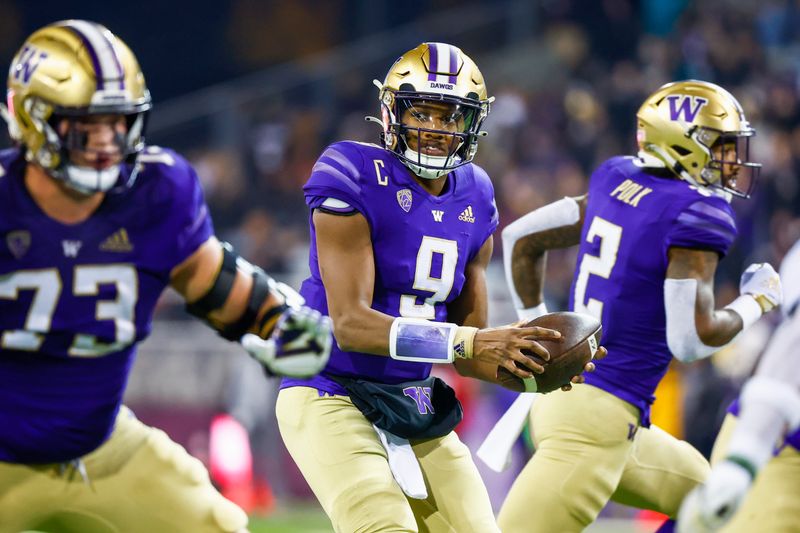 Nov 19, 2022; Seattle, Washington, USA; Washington Huskies quarterback Michael Penix Jr. (9) drops back to pass against the Colorado Buffaloes during the second quarter at Alaska Airlines Field at Husky Stadium. Mandatory Credit: Joe Nicholson-USA TODAY Sports