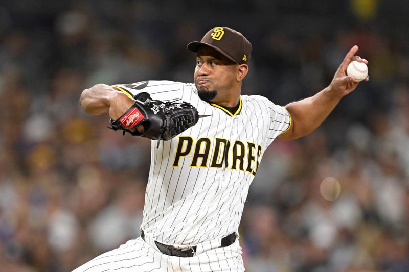 Sep 9, 2025; San Diego, California, USA; San Diego Padres relief pitcher Wandy Peralta (58) delivers during the seventh inning against the Cincinnati Reds at Petco Park. Mandatory Credit: Denis Poroy-Imagn Images