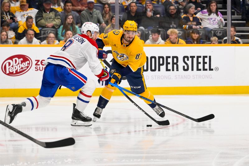 Mar 28, 2026; Nashville, Tennessee, USA;  Montreal Canadiens defenseman Mike Matheson (8) blocks the shot of Nashville Predators defenseman Adam Wilsby (83) during the third period Gat Bridgestone Arena. Mandatory Credit: Steve Roberts-Imagn Images