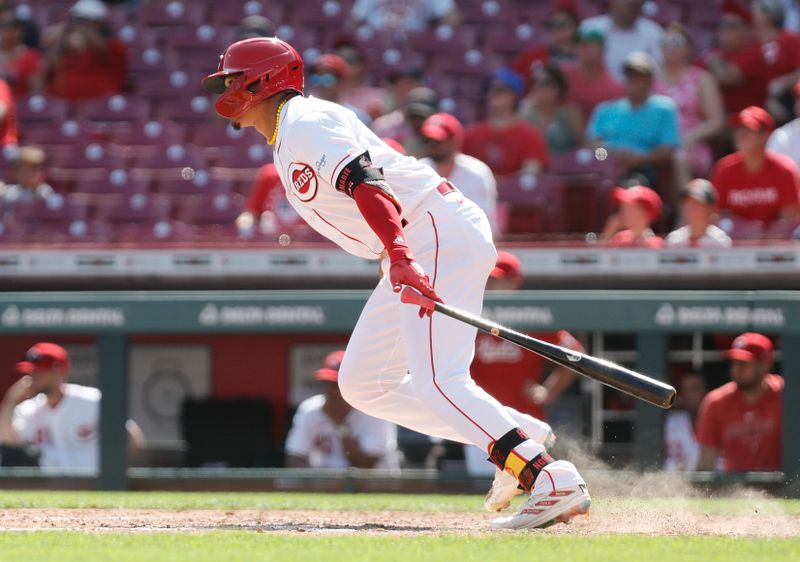 Aug 20, 2023; Cincinnati, Ohio, USA; Cincinnati Reds third baseman Noelvi Martels (16) hits his first major league hit a double against the Toronto Blue Jays during the ninth inning at Great American Ball Park. Mandatory Credit: David Kohl-USA TODAY Sports