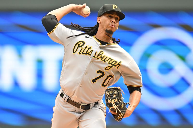 Aug 20, 2023; Minneapolis, Minnesota, USA; Pittsburgh Pirates starting pitcher Osvaldo Bido (70) throws a pitch against the Minnesota Twins during the third inning at Target Field. Mandatory Credit: Jeffrey Becker-USA TODAY Sports