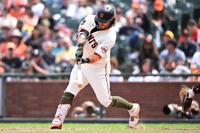 May 21, 2023; San Francisco, California, USA; San Francisco Giants infielder Brandon Crawford (35) bats against the Miami Marlins during the eighth inning at Oracle Park. Mandatory Credit: Robert Edwards-USA TODAY Sports