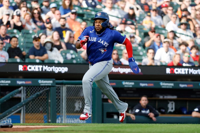 May 24, 2024; Detroit, Michigan, USA; Toronto Blue Jays first baseman Vladimir Guerrero Jr. (27) runs to home plate in the first inning against the Detroit Tigers at Comerica Park. Mandatory Credit: Brian Bradshaw Sevald-USA TODAY Sports