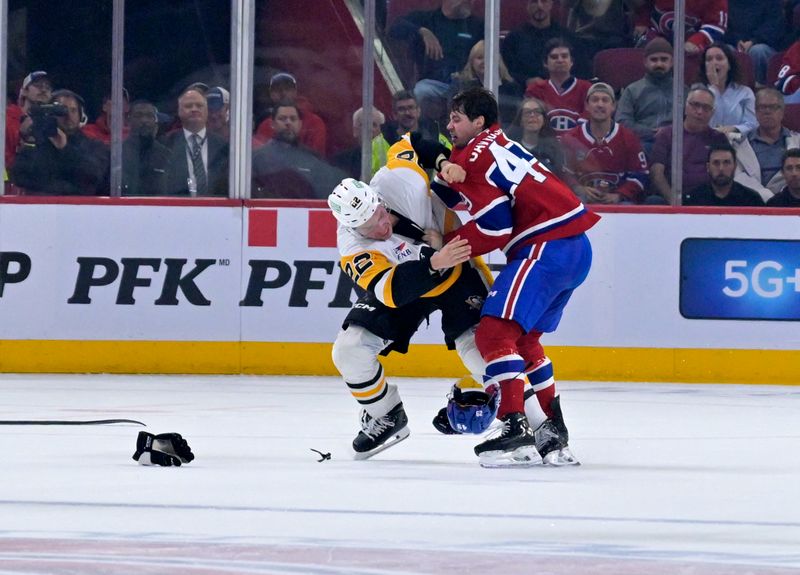 Sep 22, 2025; Montreal, Quebec, CAN; Pittsburgh Penguins forward Sam Poulin (22) and Montreal Canadiens forward Jared Davidson (49) fight during the second period at the Bell Centre. Mandatory Credit: Eric Bolte-Imagn Images