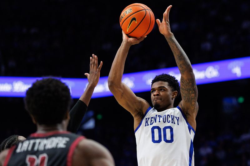 Dec 9, 2025; Lexington, Kentucky, USA; Kentucky Wildcats guard Otega Oweh (00) shoots the ball during the second half against the North Carolina Central Eagles at Rupp Arena at Central Bank Center. Mandatory Credit: Jordan Prather-Imagn Images