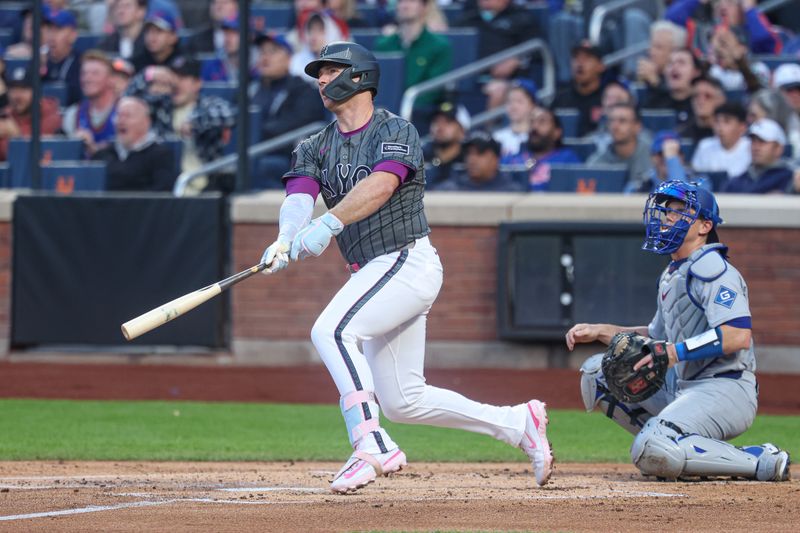 May 25, 2025; New York City, New York, USA; New York Mets first baseman Pete Alonso (20) hits a two run home run during the first inning against the Los Angeles Dodgers at Citi Field. Mandatory Credit: Vincent Carchietta-Imagn Images