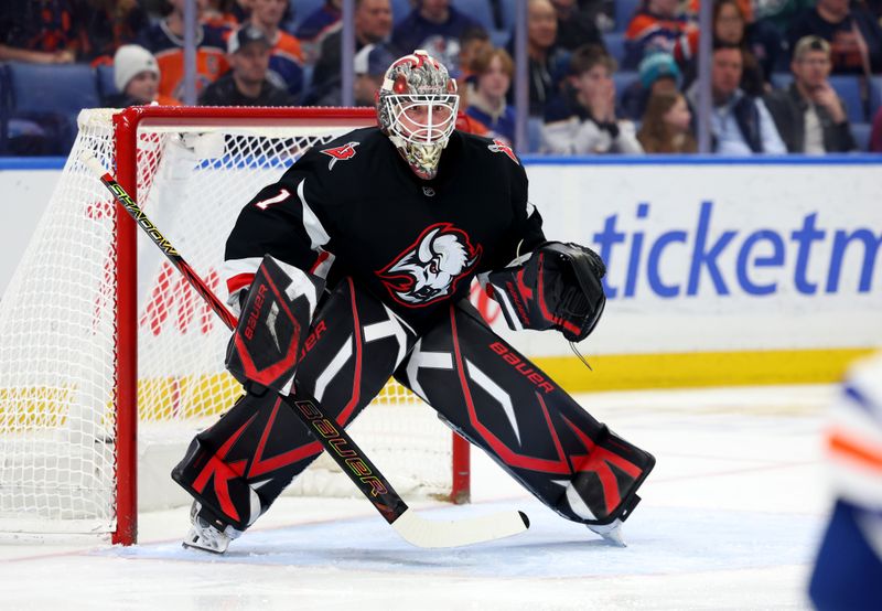 Mar 10, 2025; Buffalo, New York, USA;  Buffalo Sabres goaltender Ukko-Pekka Luukkonen (1) looks for the puck during the first period against the Edmonton Oilers at KeyBank Center. Mandatory Credit: Timothy T. Ludwig-Imagn Images
