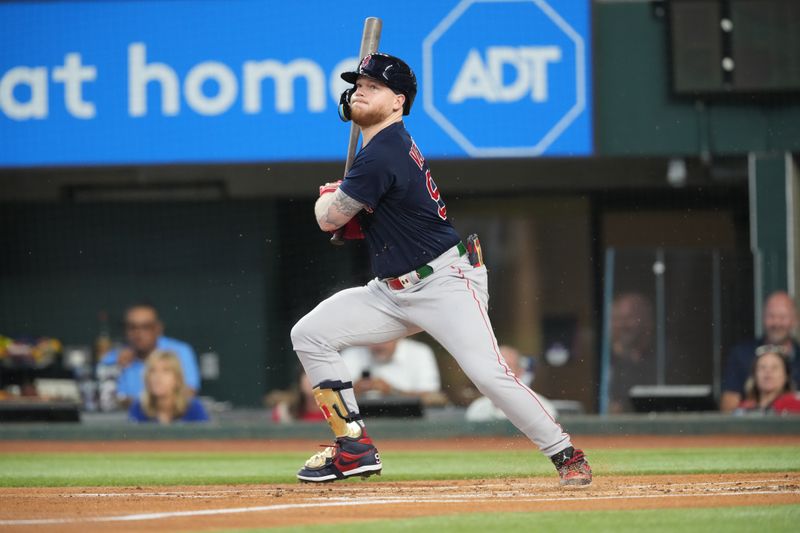 Sep 20, 2023; Arlington, Texas, USA; Boston Red Sox right fielder Alex Verdugo (99) follows through on a single against the Texas Rangers during the first inning at Globe Life Field. Mandatory Credit: Jim Cowsert-USA TODAY Sports