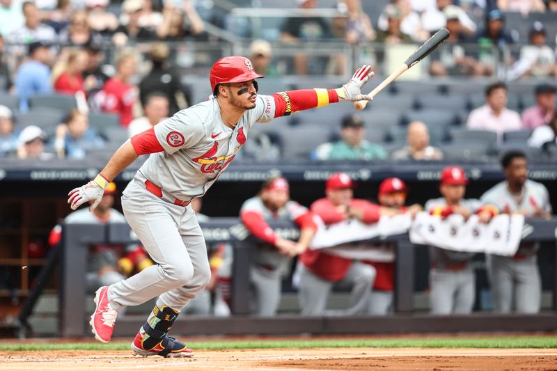 Sep 1, 2024; Bronx, New York, USA;  St. Louis Cardinals third baseman Nolan Arenado (28) hits a single in the first inning against the New York Yankees at Yankee Stadium. Mandatory Credit: Wendell Cruz-USA TODAY Sports