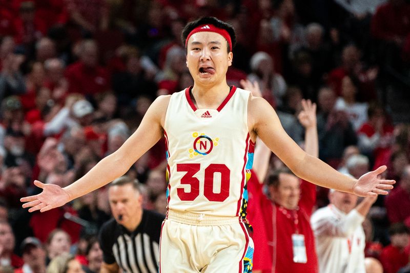 Feb 17, 2024; Lincoln, Nebraska, USA;  Nebraska Cornhuskers guard Keisei Tominaga (30) reacts during the first quarter at Pinnacle Bank Arena. Mandatory Credit: Dylan Widger-USA TODAY Sports