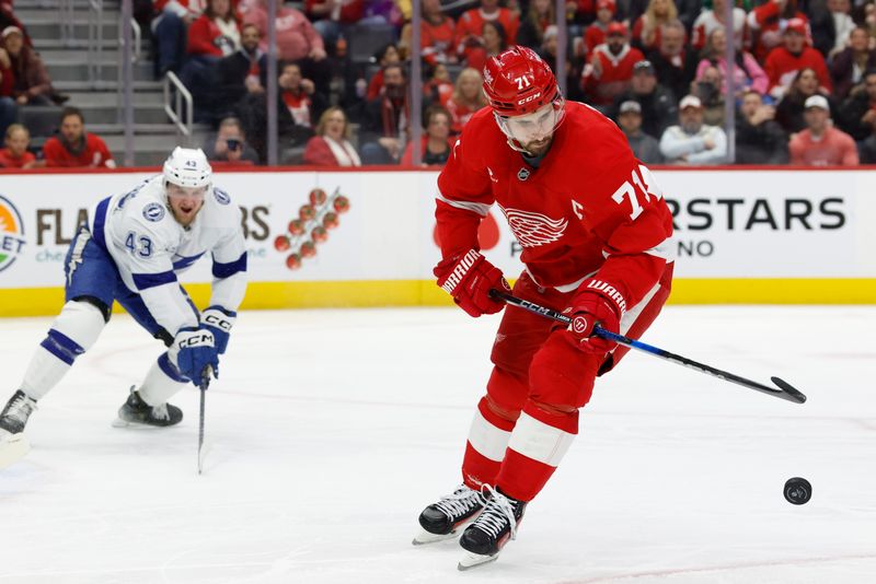 Jan 25, 2025; Detroit, Michigan, USA;  Detroit Red Wings center Dylan Larkin (71) skates with the puck in the second period against the Tampa Bay Lightning at Little Caesars Arena. Mandatory Credit: Rick Osentoski-Imagn Images