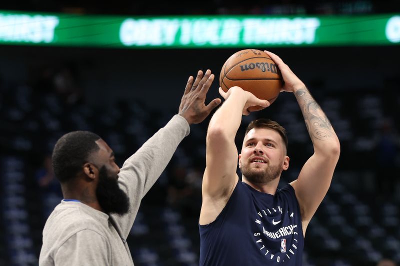 DALLAS, TEXAS - OCTOBER 24: Luka Doncic #77 of the Dallas Mavericks warms up before playing the San Antonio Spurs at American Airlines Center on October 24, 2024 in Dallas, Texas.  NOTE TO USER: User expressly acknowledges and agrees that, by downloading and or using this photograph, User is consenting to the terms and conditions of the Getty Images License Agreement. (Photo by Sam Hodde/Getty Images)