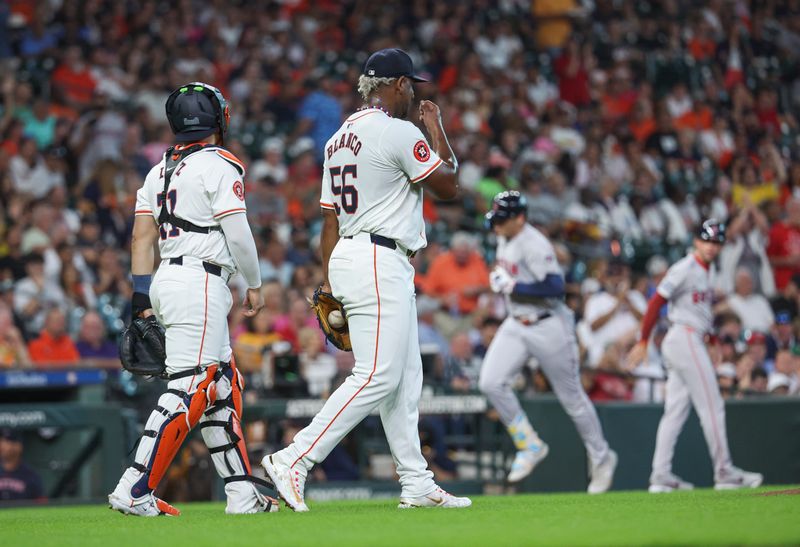 Aug 20, 2024; Houston, Texas, USA; Houston Astros starting pitcher Ronel Blanco (56) and catcher Yainer Diaz (21) react and Boston Red Sox first baseman Triston Casas (36) rounds the bases after hitting a home run during the first inning at Minute Maid Park. Mandatory Credit: Troy Taormina-USA TODAY Sports