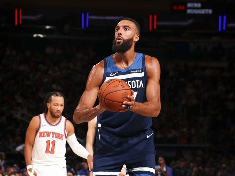 NEW YORK, NY - OCTOBER 13: Rudy Gobert #27 of the Minnesota Timberwolves shoots a free throw during the game on October 13, 2024 at Madison Square Garden in New York City, New York.  NOTE TO USER: User expressly acknowledges and agrees that, by downloading and or using this photograph, User is consenting to the terms and conditions of the Getty Images License Agreement. Mandatory Copyright Notice: Copyright 2024 NBAE  (Photo by David L. Nemec/NBAE via Getty Images)