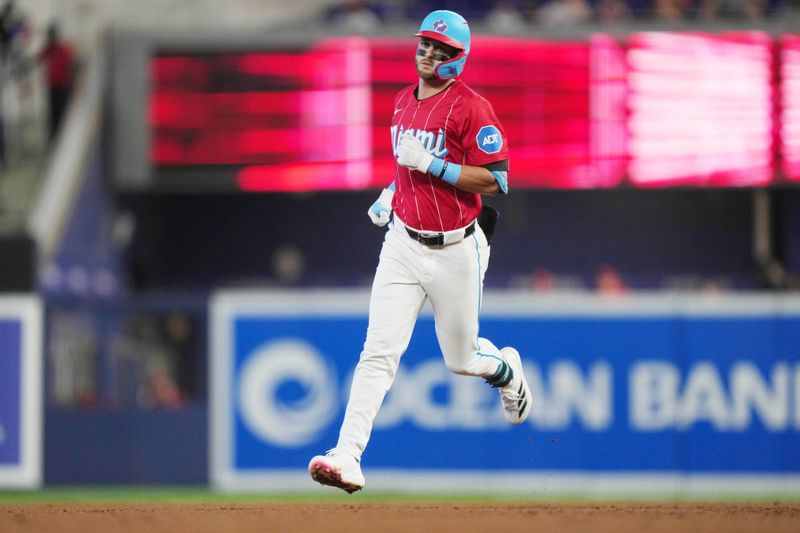 Sep 7, 2024; Miami, Florida, USA;  Miami Marlins third baseman Connor Norby (24) rounds the bases after hitting a two-run home run in the first inning against the Philadelphia Phillies at loanDepot Park. Mandatory Credit: Jim Rassol-Imagn Images