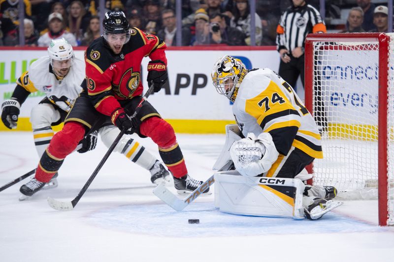 Mar 26, 2026; Ottawa, Ontario, CAN; Pittsburgh Penguins goalie Stuart Skinner (74) makes a save in front of Ottawa Senators right wing Drake Batherson (19) in the first period at the Canadian Tire Centre. Mandatory Credit: Marc DesRosiers-IMAGN Images