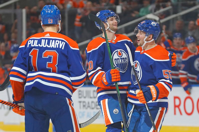 Sep 25, 2022; Edmonton, Alberta, CAN; Edmonton Oilers celebrate the goal by defensemen Markus Neimelainen (80) during the first period against the Winnipeg Jets at Rogers Place. Mandatory Credit: Perry Nelson-USA TODAY Sports