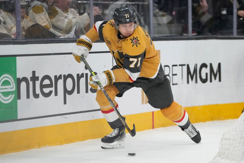 Dec 28, 2023; Las Vegas, Nevada, USA; Vegas Golden Knights center William Karlsson (71) skates with the puck against the Los Angeles Kings during the first period at T-Mobile Arena. Mandatory Credit: Lucas Peltier-USA TODAY Sports