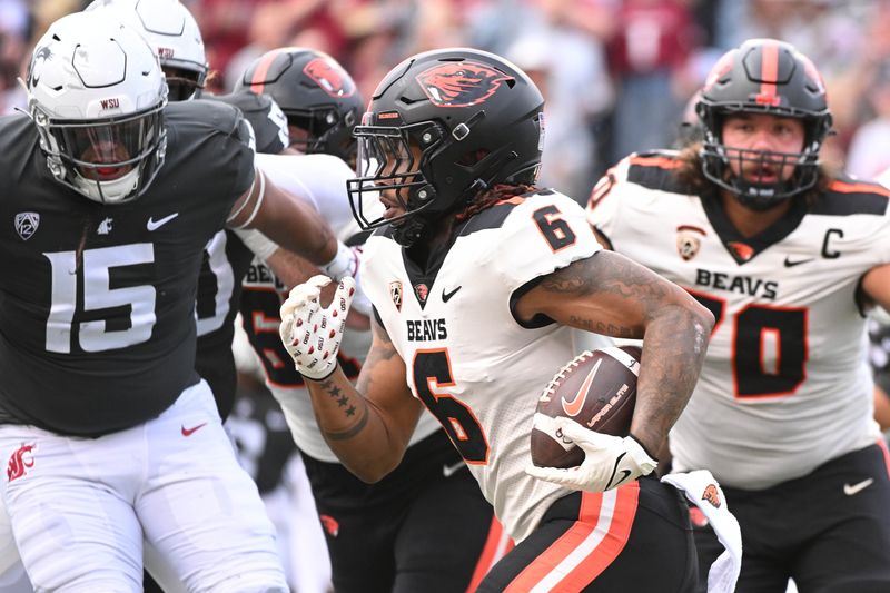 Sep 23, 2023; Pullman, Washington, USA; Oregon State Beavers running back Damien Martinez (6) carries the ball against the Washington State Cougars in the first half at Gesa Field at Martin Stadium. Mandatory Credit: James Snook-USA TODAY Sports