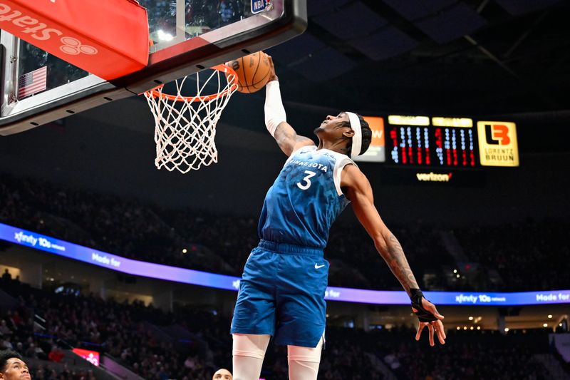 PORTLAND, OREGON - FEBRUARY 15: Jaden McDaniels #3 of the Minnesota Timberwolves dunks during the second quarter of the game against the Portland Trail Blazers at the Moda Center on February 15, 2024 in Portland, Oregon. NOTE TO USER: User expressly acknowledges and agrees that, by downloading and or using this photograph, User is consenting to the terms and conditions of the Getty Images License Agreement. (Photo by Alika Jenner/Getty Images)