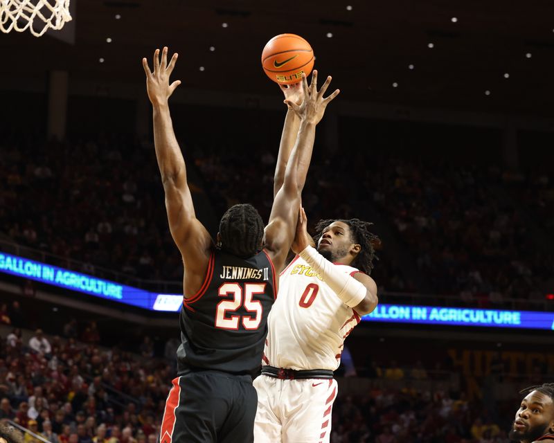 Feb 17, 2024; Ames, Iowa, USA;  Iowa State Cyclones forward Tre King (0) shoots the ball over Texas Tech Red Raiders forward Robert Jennings (25) during the first half at James H. Hilton Coliseum. Mandatory Credit: Reese Strickland-USA TODAY Sports