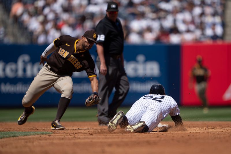 May 28, 2023; Bronx, New York, USA; New York Yankees center fielder Harrison Bader (22) steals second base ahead of San Diego Padres manager Bob Melvin (2) tag during the third inning at Yankee Stadium. Mandatory Credit: Gregory Fisher-USA TODAY Sports