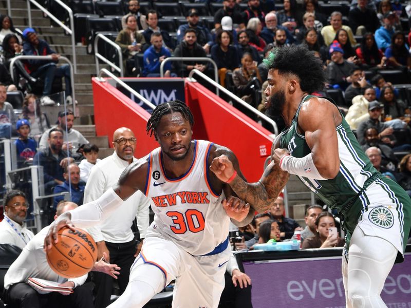 DETROIT, MI - NOVEMBER 29: Julius Randle #30 of the New York Knicks dribbles the ball during the game against the Detroit Pistons on November 29, 2022 at Little Caesars Arena in Detroit, Michigan. NOTE TO USER: User expressly acknowledges and agrees that, by downloading and/or using this photograph, User is consenting to the terms and conditions of the Getty Images License Agreement. Mandatory Copyright Notice: Copyright 2022 NBAE (Photo by Chris Schwegler/NBAE via Getty Images)