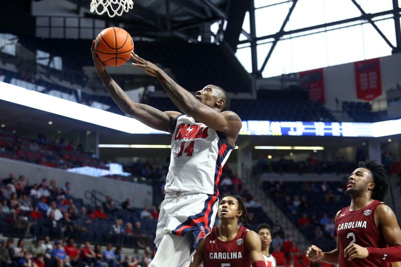 Feb 11, 2023; Oxford, Mississippi, USA; Mississippi Rebels guard Tye Fagan (14) drives to the basket during the second half against the South Carolina Gamecocks at The Sandy and John Black Pavilion at Ole Miss. Mandatory Credit: Petre Thomas-USA TODAY Sports