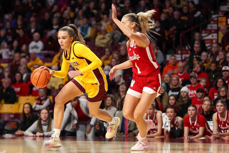 Jan 14, 2024; Minneapolis, Minnesota, USA; Minnesota Golden Gophers guard Mara Braun (10) works around Nebraska Cornhuskers guard Jaz Shelley (1) during the first half at Williams Arena. Mandatory Credit: Matt Krohn-USA TODAY Sports