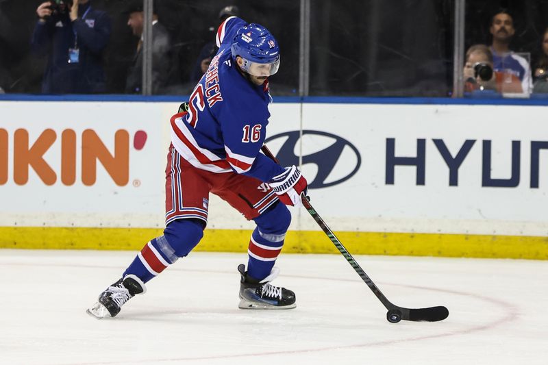 Nov 12, 2024; New York, New York, USA;  New York Rangers center Vincent Trocheck (16) attempts a shot on goal in the second period against the Winnipeg Jets at Madison Square Garden. Mandatory Credit: Wendell Cruz-Imagn Images