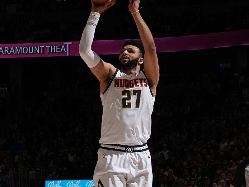 DENVER, CO - FEBRUARY 28: Jamal Murray #27 of the Denver Nuggets three point basket during the game against the Sacramento Kings on February 28, 2024 at the Ball Arena in Denver, Colorado. NOTE TO USER: User expressly acknowledges and agrees that, by downloading and/or using this Photograph, user is consenting to the terms and conditions of the Getty Images License Agreement. Mandatory Copyright Notice: Copyright 2024 NBAE (Photo by Garrett Ellwood/NBAE via Getty Images)