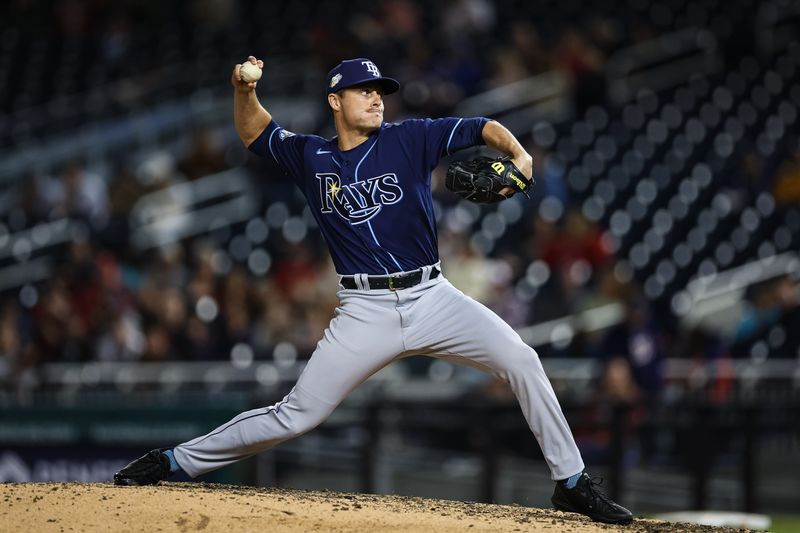 Apr 3, 2023; Washington, District of Columbia, USA; Tampa Bay Rays relief pitcher Calvin Faucher (58) delivers a pitch against the Washington Nationals during the eighth inning at Nationals Park. Mandatory Credit: Scott Taetsch-USA TODAY Sports