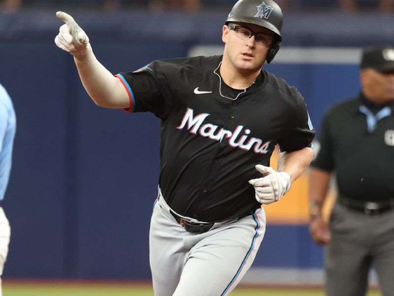 Jul 31, 2024; St. Petersburg, Florida, USA; Miami Marlins third base Jonah Bride (41) runs the bases after hitting a home run against the Tampa Bay Rays during the second inning at Tropicana Field. Mandatory Credit: Kim Klement Neitzel-USA TODAY Sports