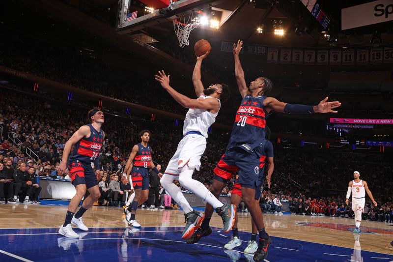 NEW YORK, NY - NOVEMBER 18: Karl-Anthony Towns #32 of the New York Knicks drives to the basket during the game against the Washington Wizards on November 18, 2024 at Madison Square Garden in New York City, New York.  NOTE TO USER: User expressly acknowledges and agrees that, by downloading and or using this photograph, User is consenting to the terms and conditions of the Getty Images License Agreement. Mandatory Copyright Notice: Copyright 2024 NBAE  (Photo by Nathaniel S. Butler/NBAE via Getty Images)