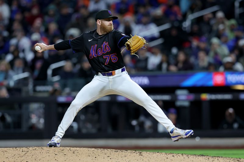 May 9, 2025; New York City, New York, USA; New York Mets relief pitcher Reed Garrett (75) pitches against the Chicago Cubs during the eighth inning at Citi Field. Mandatory Credit: Brad Penner-Imagn Images