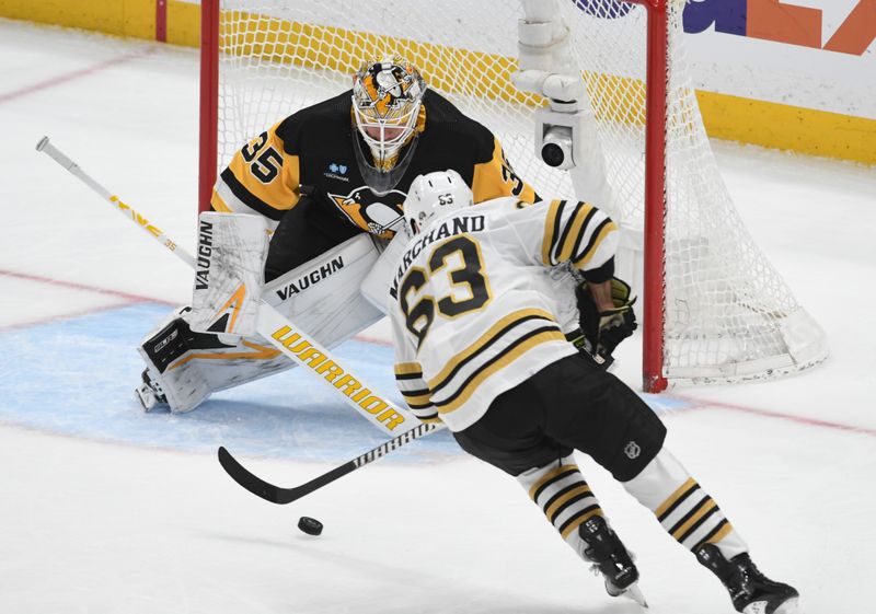 Apr 13, 2024; Pittsburgh, Pennsylvania, USA; Boston Bruins left wing Brad Marchand (63) scores on Pittsburgh Penguins goalie Tristan Jarry (35)  during the second period at PPG Paints Arena. Mandatory Credit: Philip G. Pavely-USA TODAY Sports