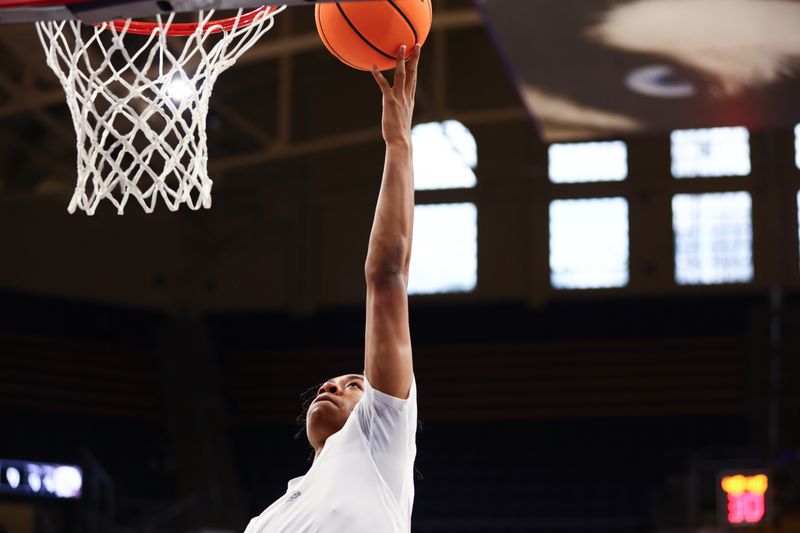 Dec 13, 2025; Seattle, Washington, USA; Washington Huskies guard BJ Roy (3) warms up before the game  at Alaska Airlines Arena at Hec Edmundson Pavilion. Mandatory Credit: Kevin Ng-Imagn Images