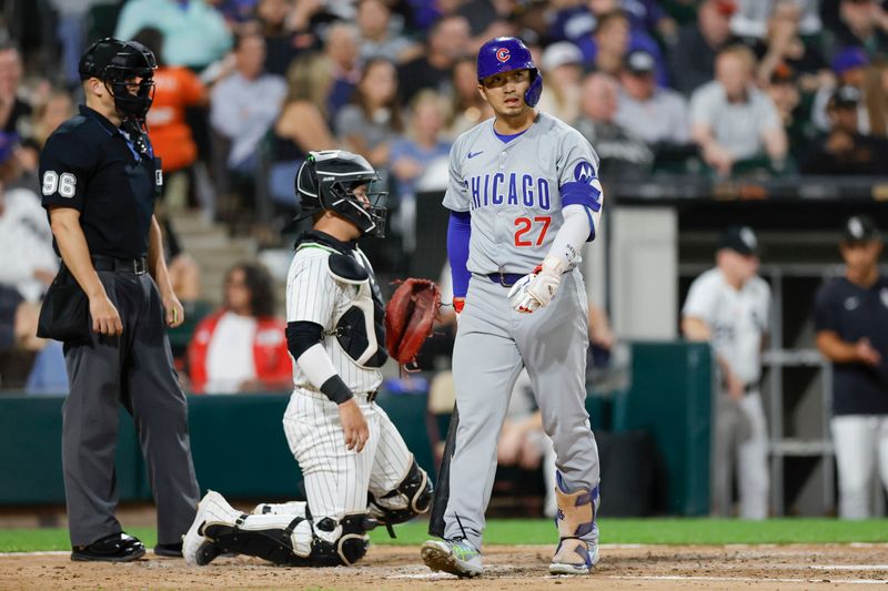 Aug 9, 2024; Chicago, Illinois, USA; Chicago Cubs outfielder Seiya Suzuki (27) reacts after striking out against the Chicago White Sox during the fourth inning at Guaranteed Rate Field. Mandatory Credit: Kamil Krzaczynski-USA TODAY Sports